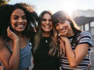 Group of friends smiling outdoors