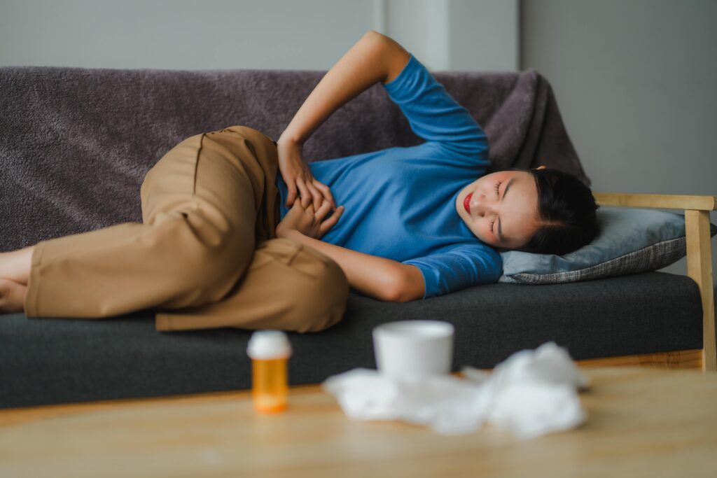 woman experiencing stomach pain
