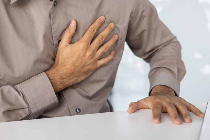 Man experiencing heart palpitations