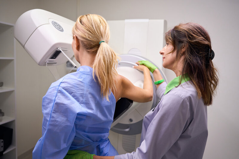 Woman undergoing a mammogram exam